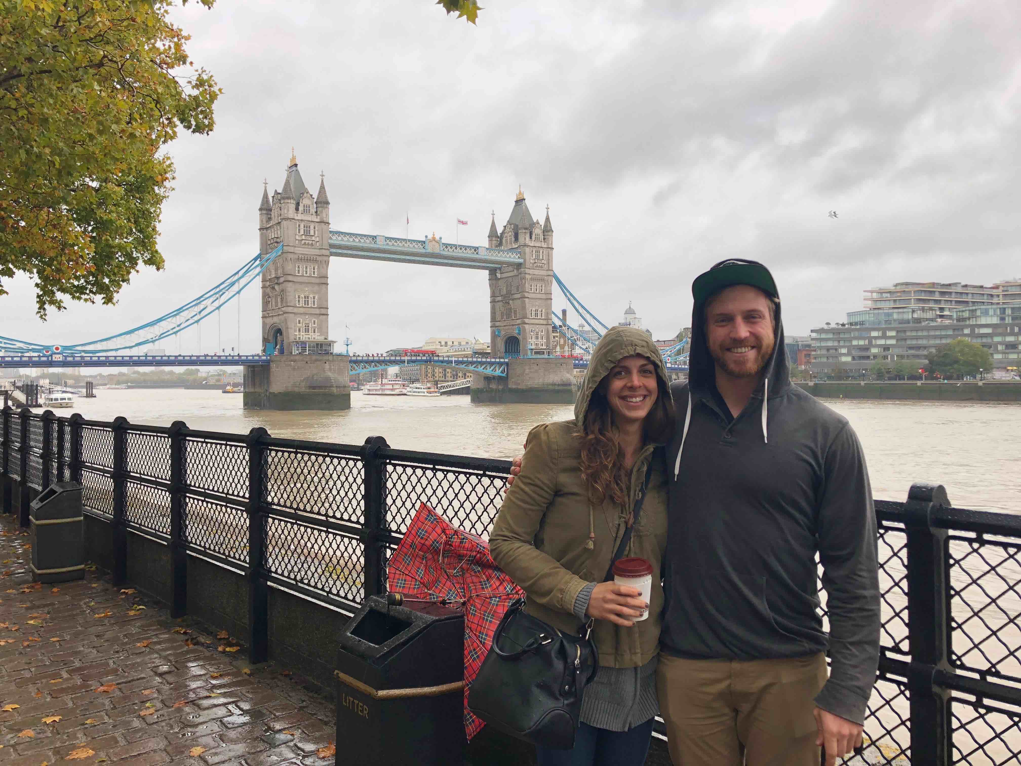 Carolyn and I (and a sad abandoned umbrella) at Tower Bridge